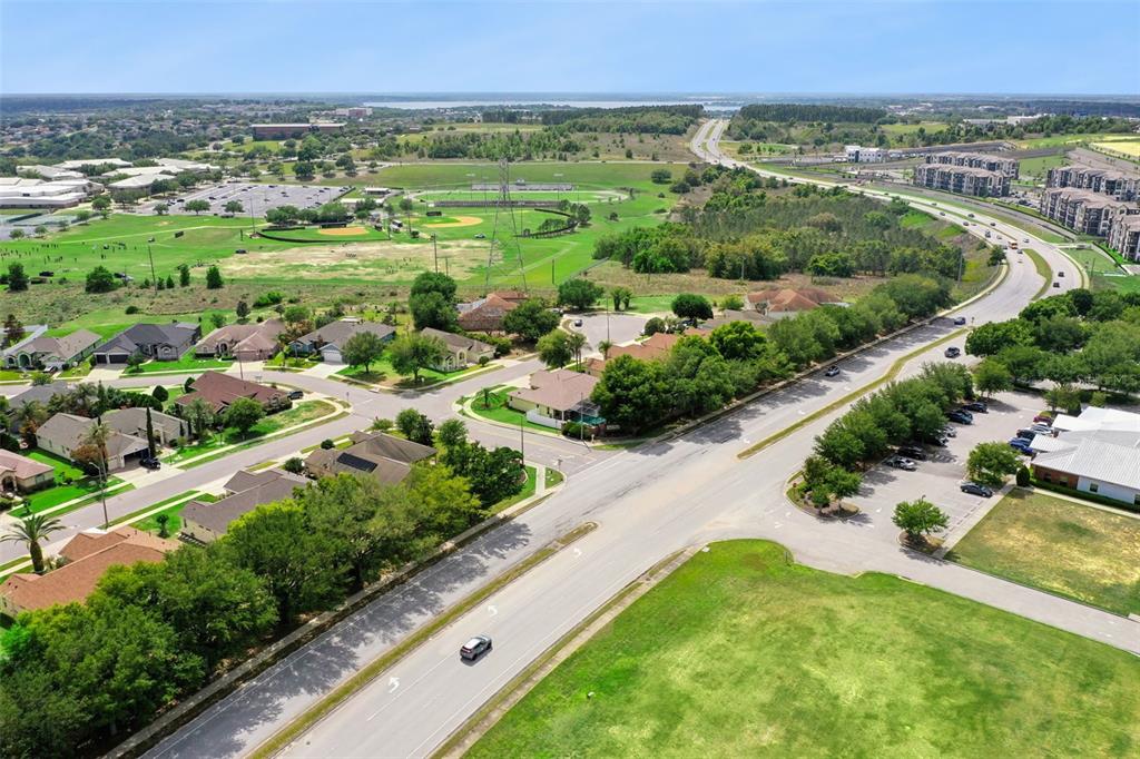 2440 Holly Ridge Court Clermont, FL 34711 - Photo 43 of 43 a view of a city with lush green forest