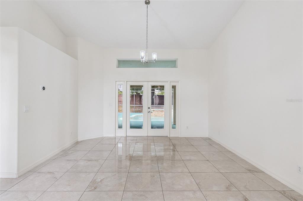 2440 Holly Ridge Court Clermont, FL 34711 - Photo 5 of 43 a view of an empty room with a window
