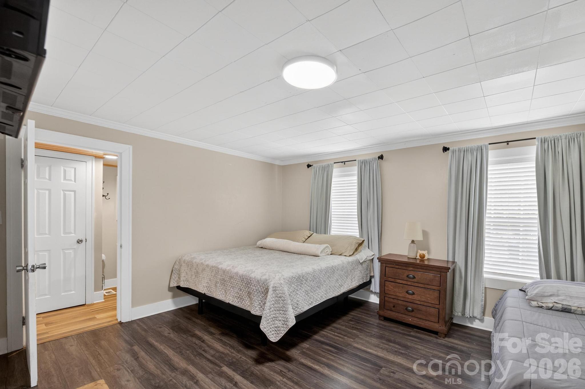 2076 Connelly Springs Road Lenoir, NC 28645 - Photo 25 of 47 a bedroom with a bed and a window