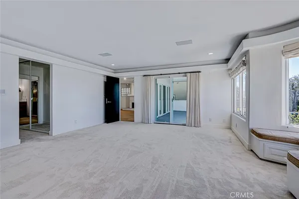a view of an empty room and window