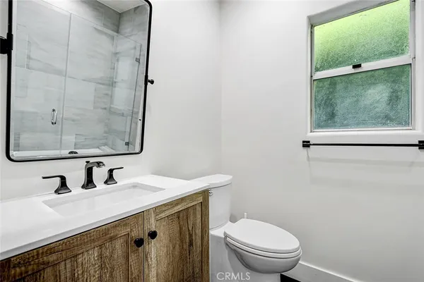 a bathroom with a shower and a bathtub