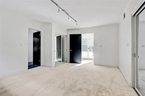 a bathroom with a sink a mirror and a shower
