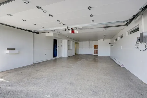 a view of an empty room with closet area