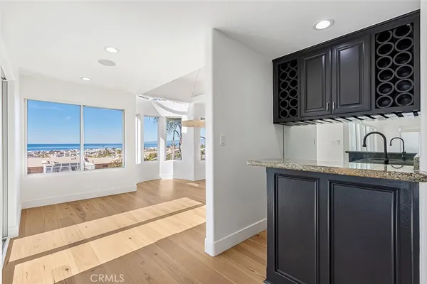 a view of a kitchen with a sink and a window