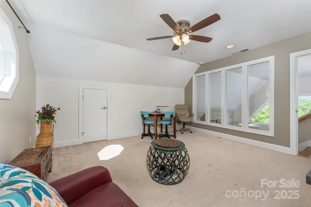 a living room with furniture and window