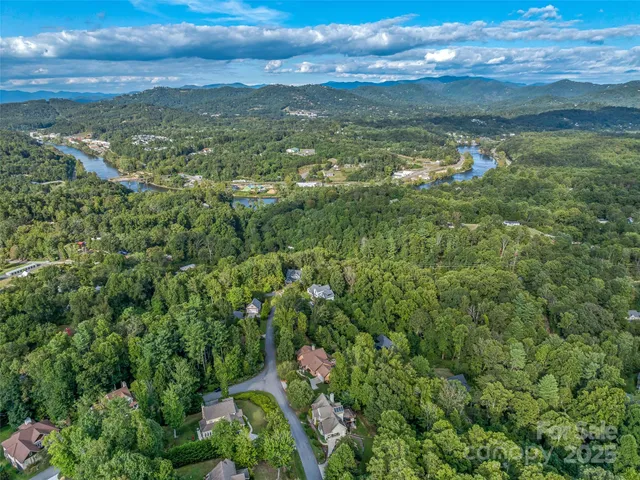 a view of a field with an ocean