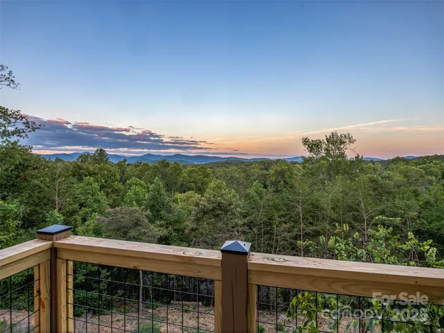 a view of a balcony with an outdoor space