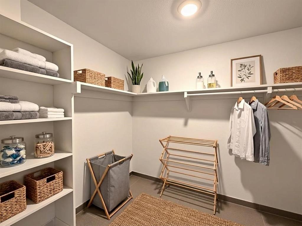 2332 Burleson Road Sherman, TX 75090 - Photo 11 of 21 a view of walk in closet with clothes and shoes
