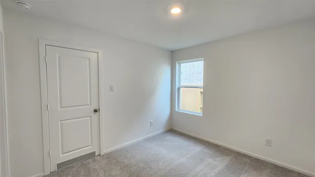 an empty room with a window