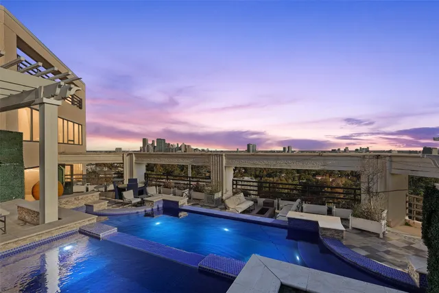 a view of a chairs and table on the wooden floor