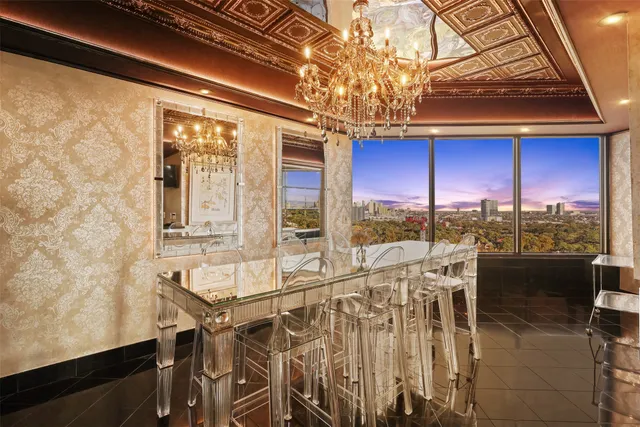 a view of a dining room with furniture window and outside view