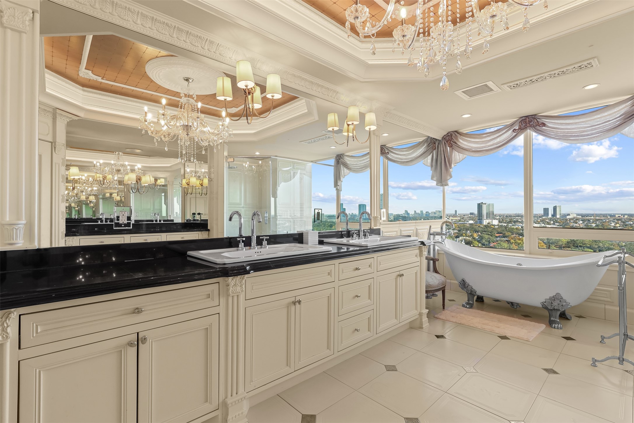 101 Westcott Street, Unit 2001 Houston, TX 77007 - Photo 23 of 47 a spacious bathroom with a granite countertop sink and a large mirror
