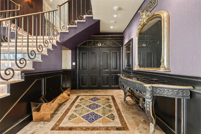 view of an entryway with a rug