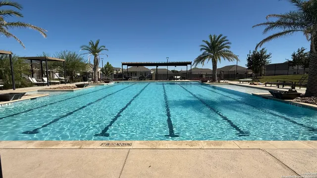a view of a yard with cars park