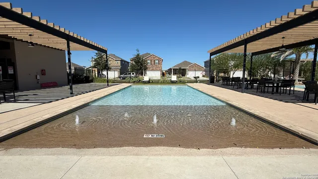 a view of a house with a swimming pool