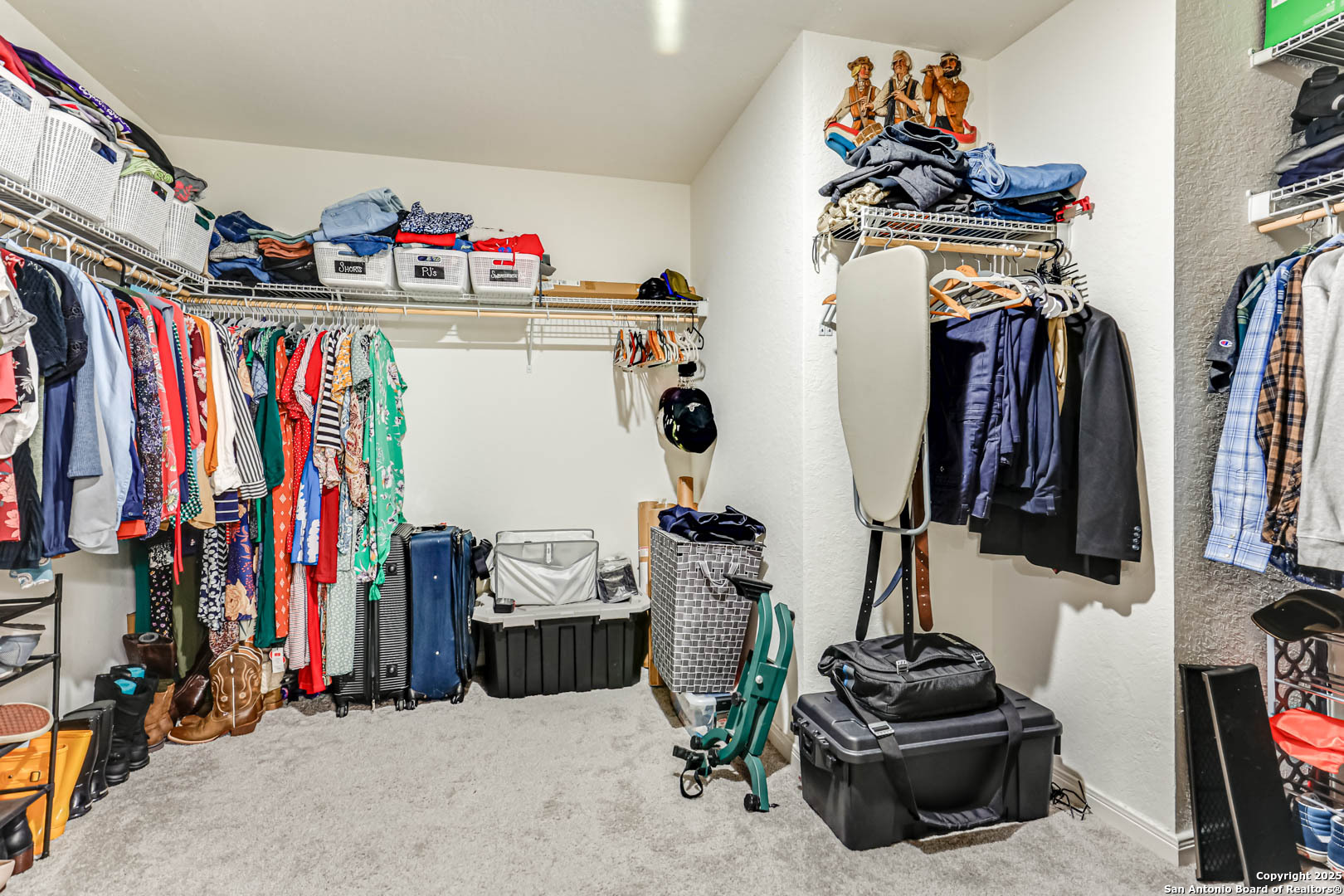 14383 Palm Ridge San Antonio, TX 78253 - Photo 45 of 45 a view of walk in closet with clothes and shoes