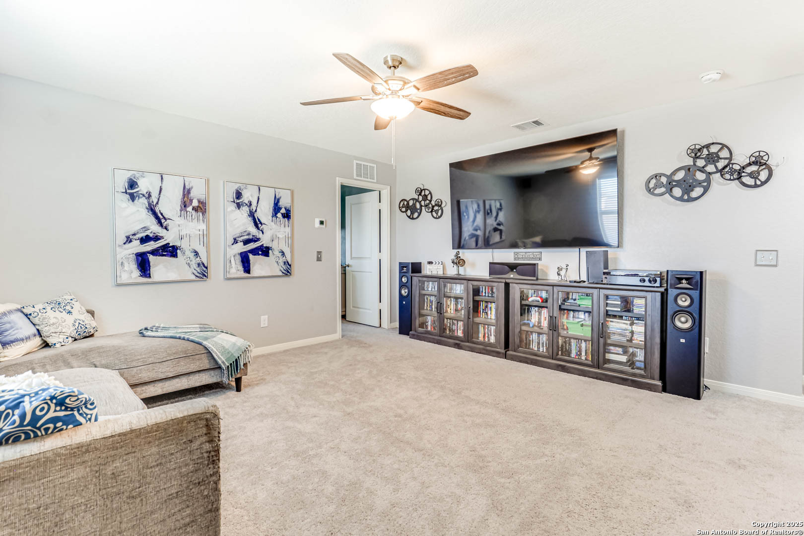14383 Palm Ridge San Antonio, TX 78253 - Photo 10 of 44 a living room with furniture and a flat screen tv