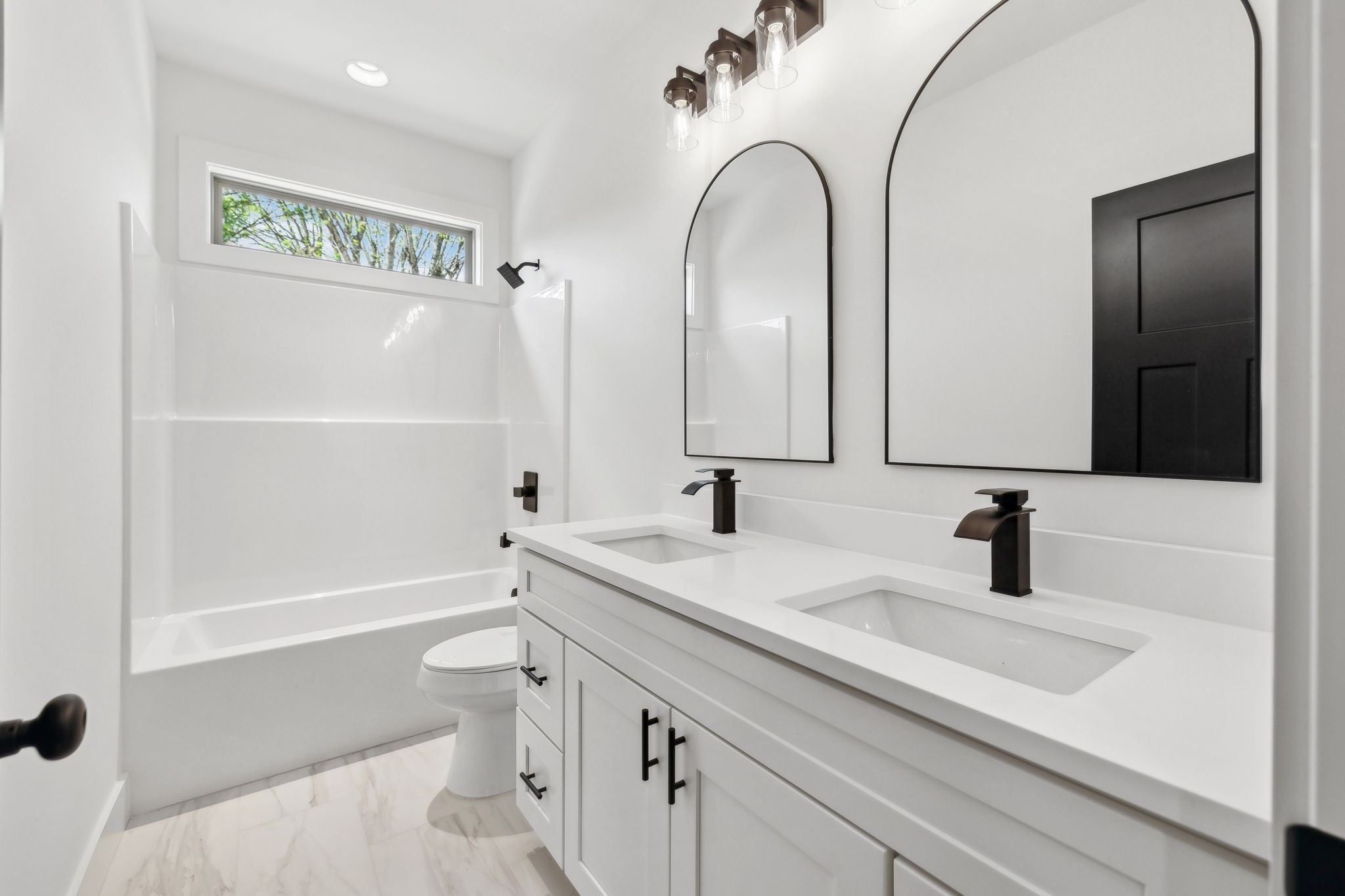 827 Oconnor Street Smithville, TN 37166 - Photo 14 of 24 a bathroom with a sink a toilet and a mirror