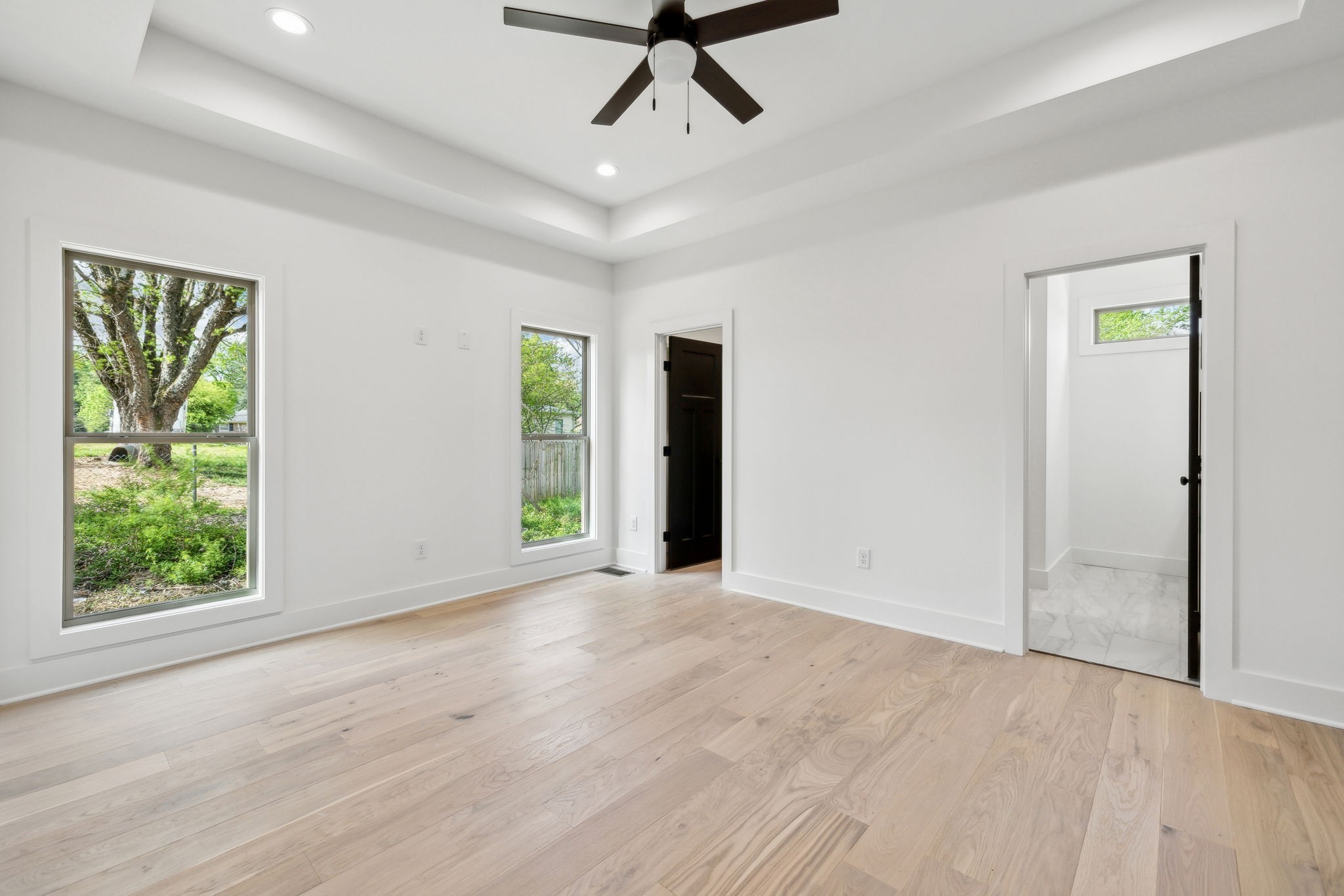 827 Oconnor Street Smithville, TN 37166 - Photo 16 of 24 wooden floor in an empty room with a window