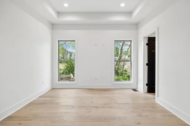 an empty room with windows