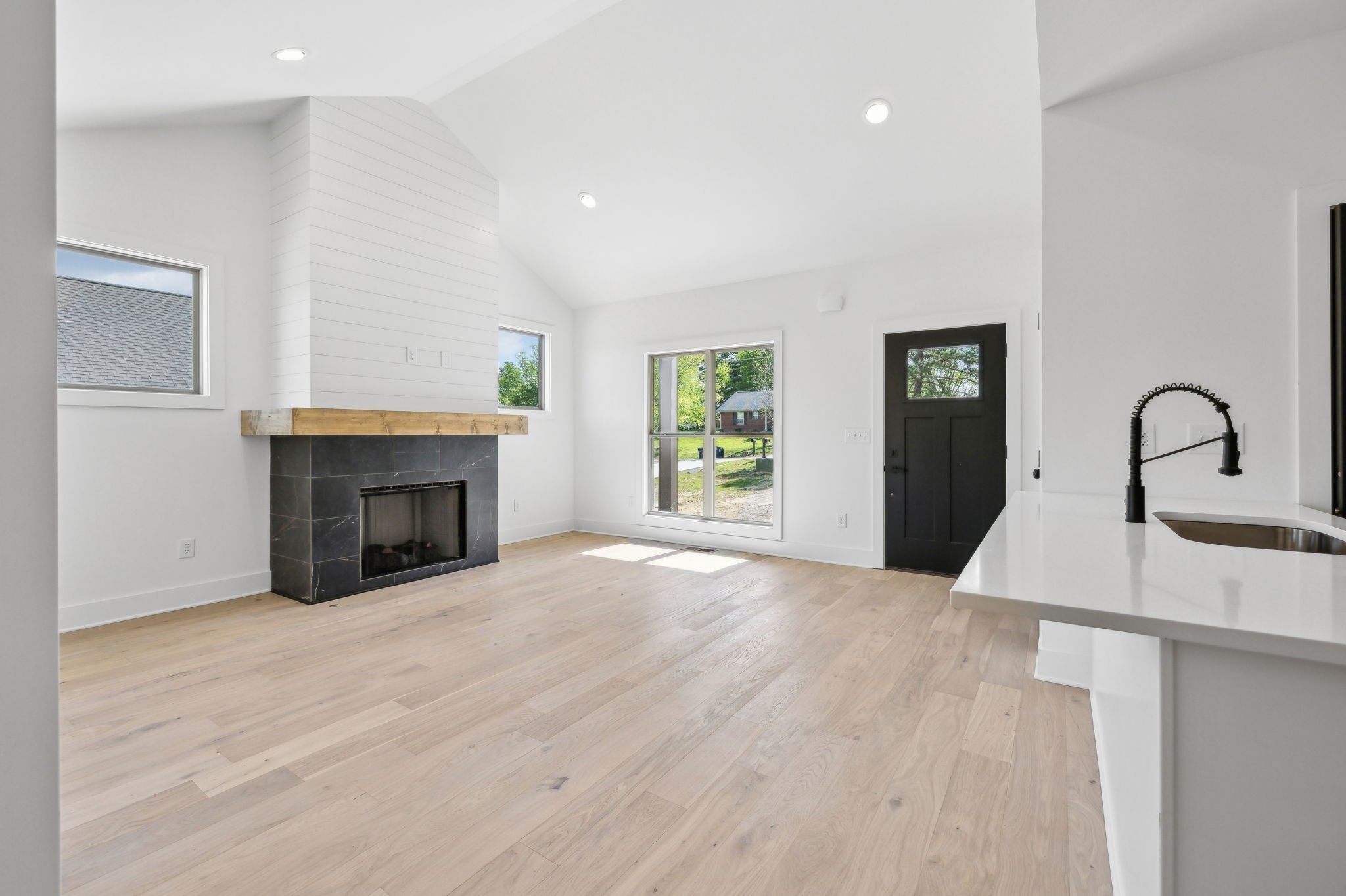 827 Oconnor Street Smithville, TN 37166 - Photo 8 of 24 a view of an empty room with window and fire place