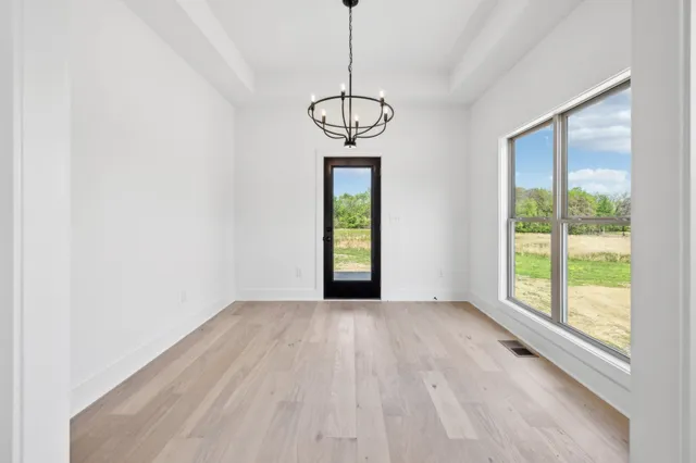 a view of an empty room with window