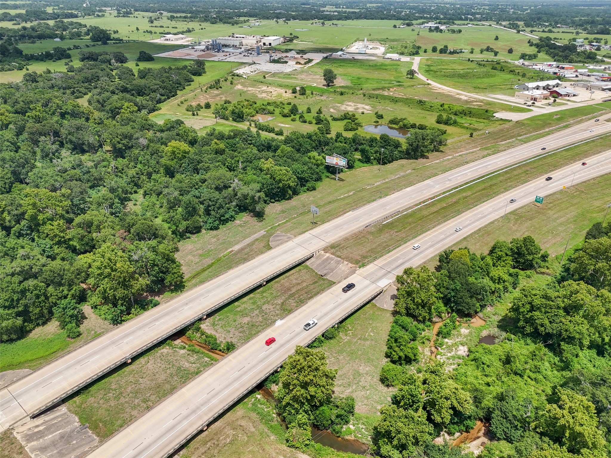0 290th Bypass Hempstead, TX 77445 - Photo 12 of 32 a view of a garden with a bench