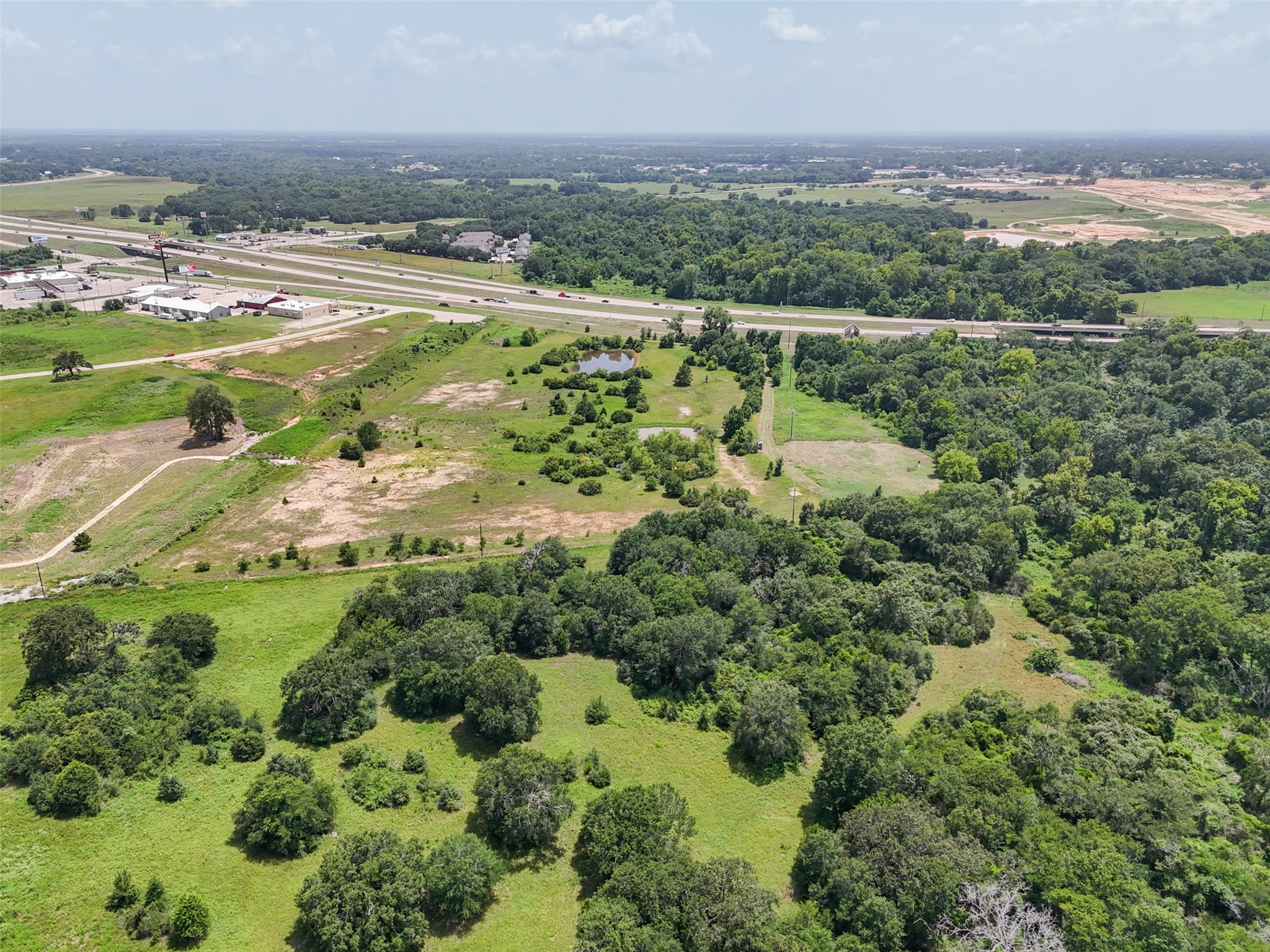 0 290th Bypass Hempstead, TX 77445 - Photo 20 of 32 an aerial view of ocean with residential houses with outdoor space and trees