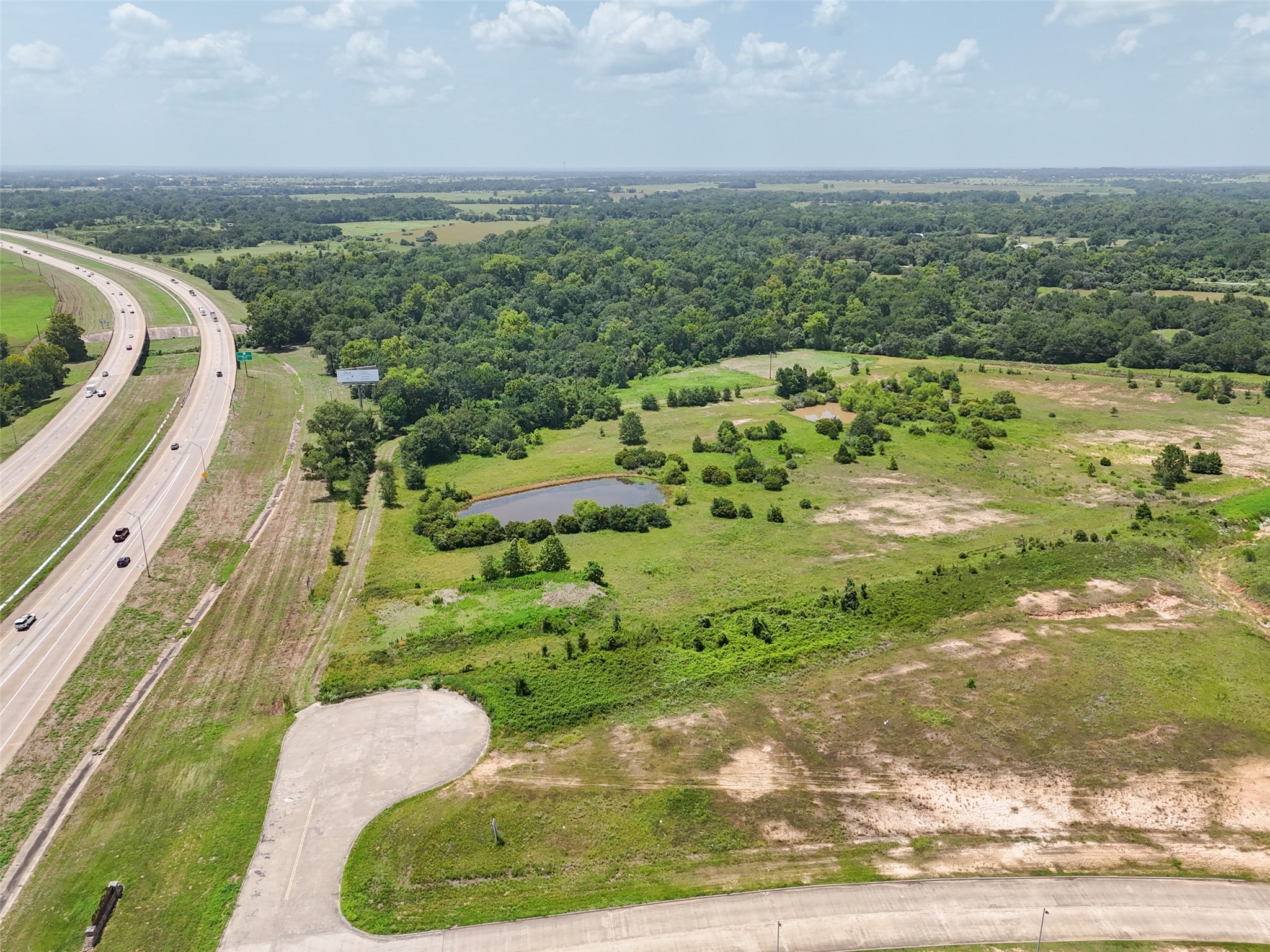 0 290th Bypass Hempstead, TX 77445 - Photo 29 of 32 a view of a swimming pool with a yard