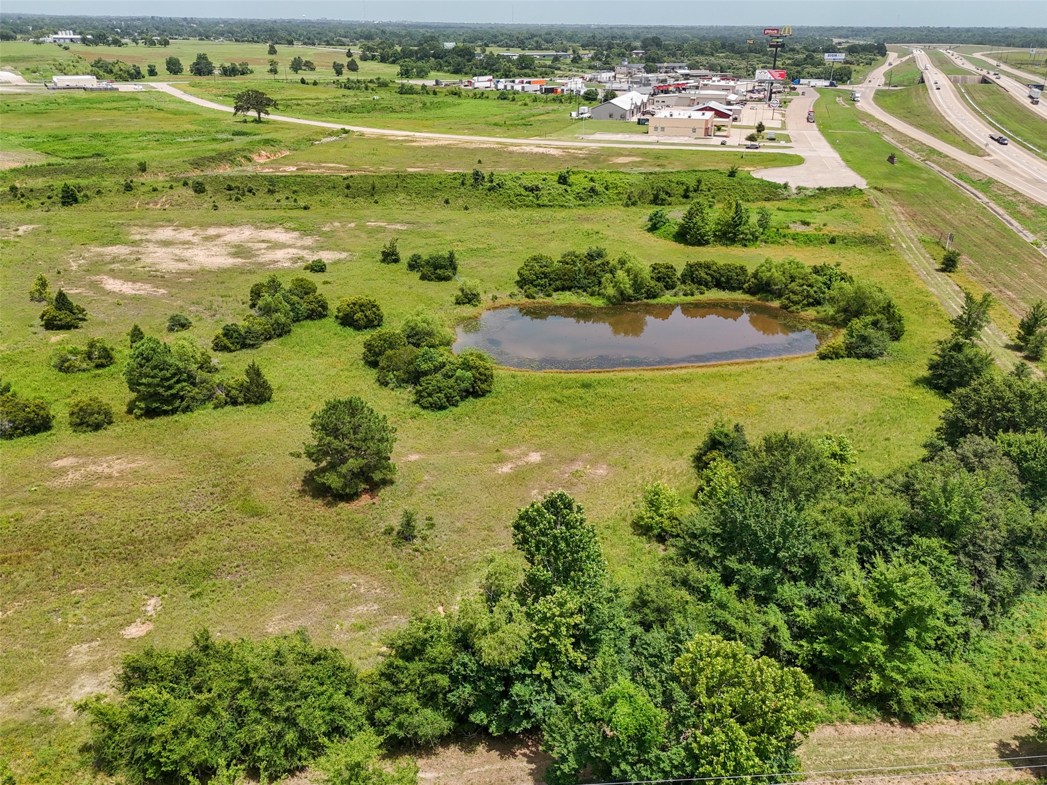 0 290th Bypass Hempstead, TX 77445 - Photo 32 of 32 a view of a lake with a city