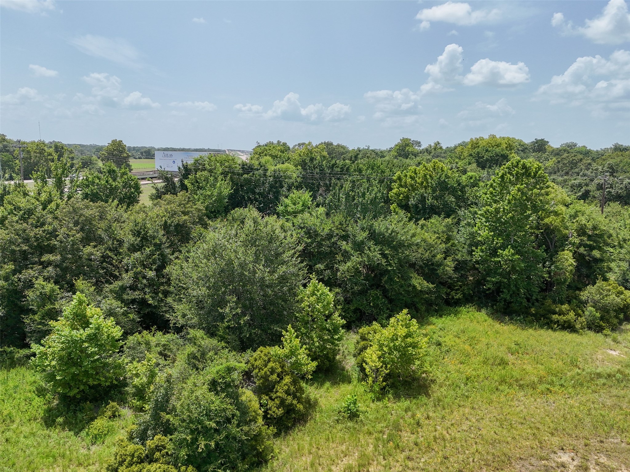 0 290th Bypass Hempstead, TX 77445 - Photo 4 of 32 an aerial view of a houses with yard and outdoor seating