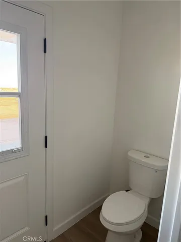 a kitchen with a sink and chandelier