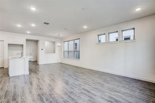 a view of kitchen with wooden floor