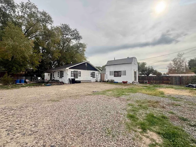 a house view with a garden space