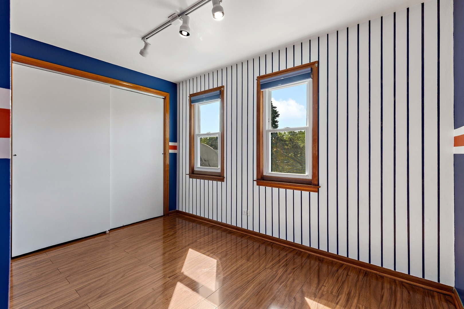 9011 24th Street Riverside, IL 60546 - Photo 12 of 22 a view of a hallway with wooden floor and windows