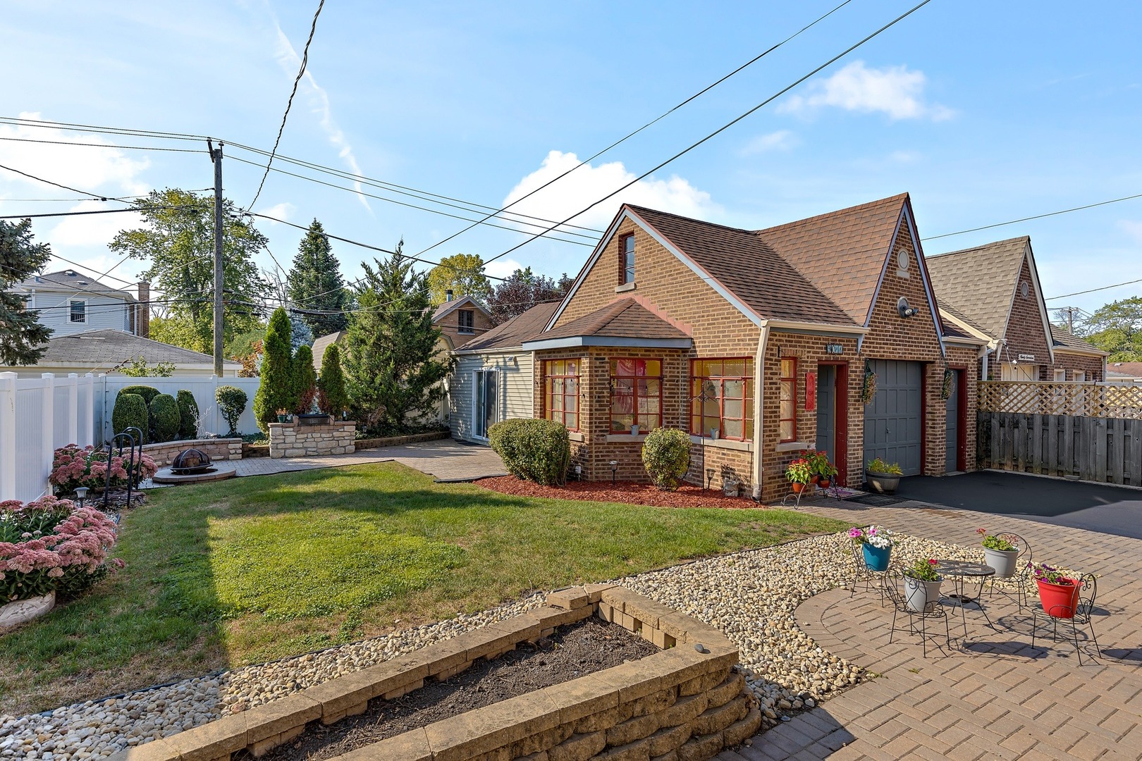9011 24th Street Riverside, IL 60546 - Photo 21 of 22 a front view of a house with garden