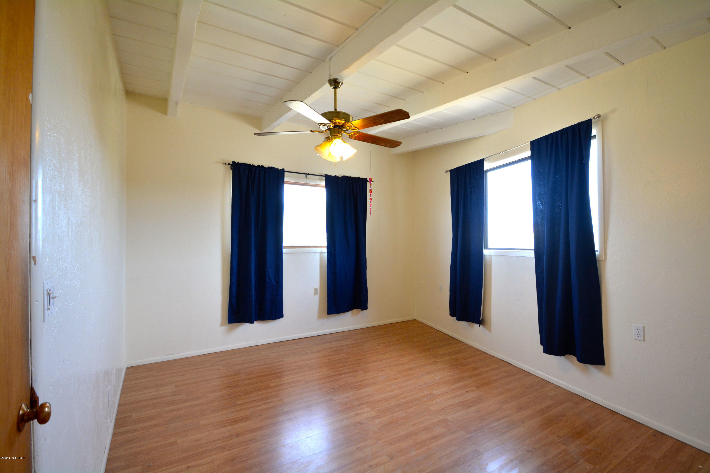 2700 Ridge Road Prescott, AZ 86301 - Photo 10 of 28 a view of a livingroom with a chandelier fan and a window