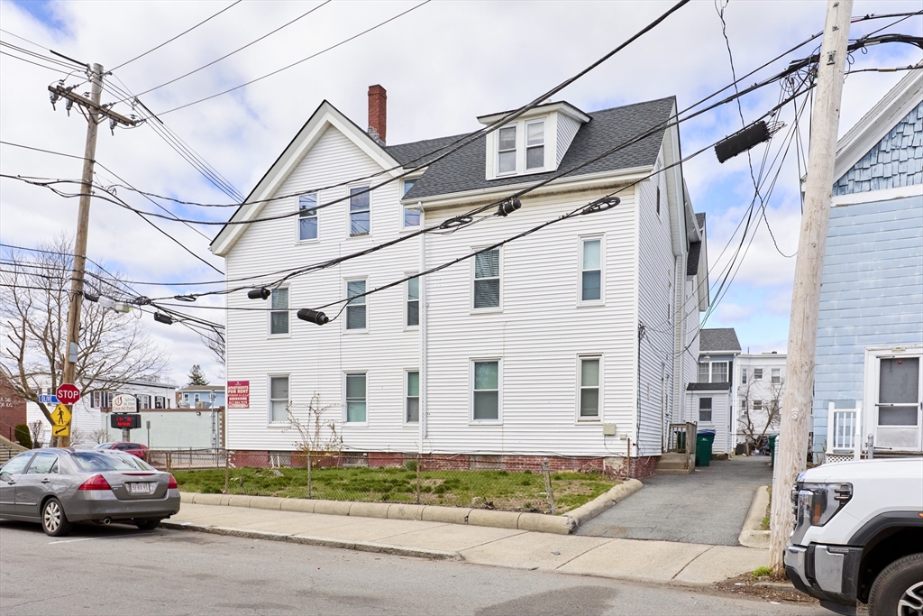 133 Chestnut Street Lynn, MA 01902 - Photo 5 of 12 a view of a white house