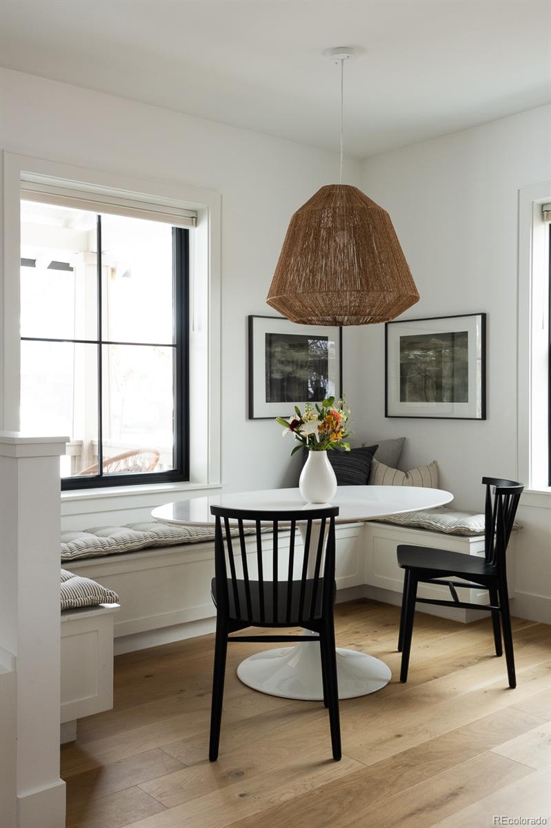 4150 Hooker Street Denver, CO 80211 - Photo 12 of 40 a living room with furniture a rug and a window