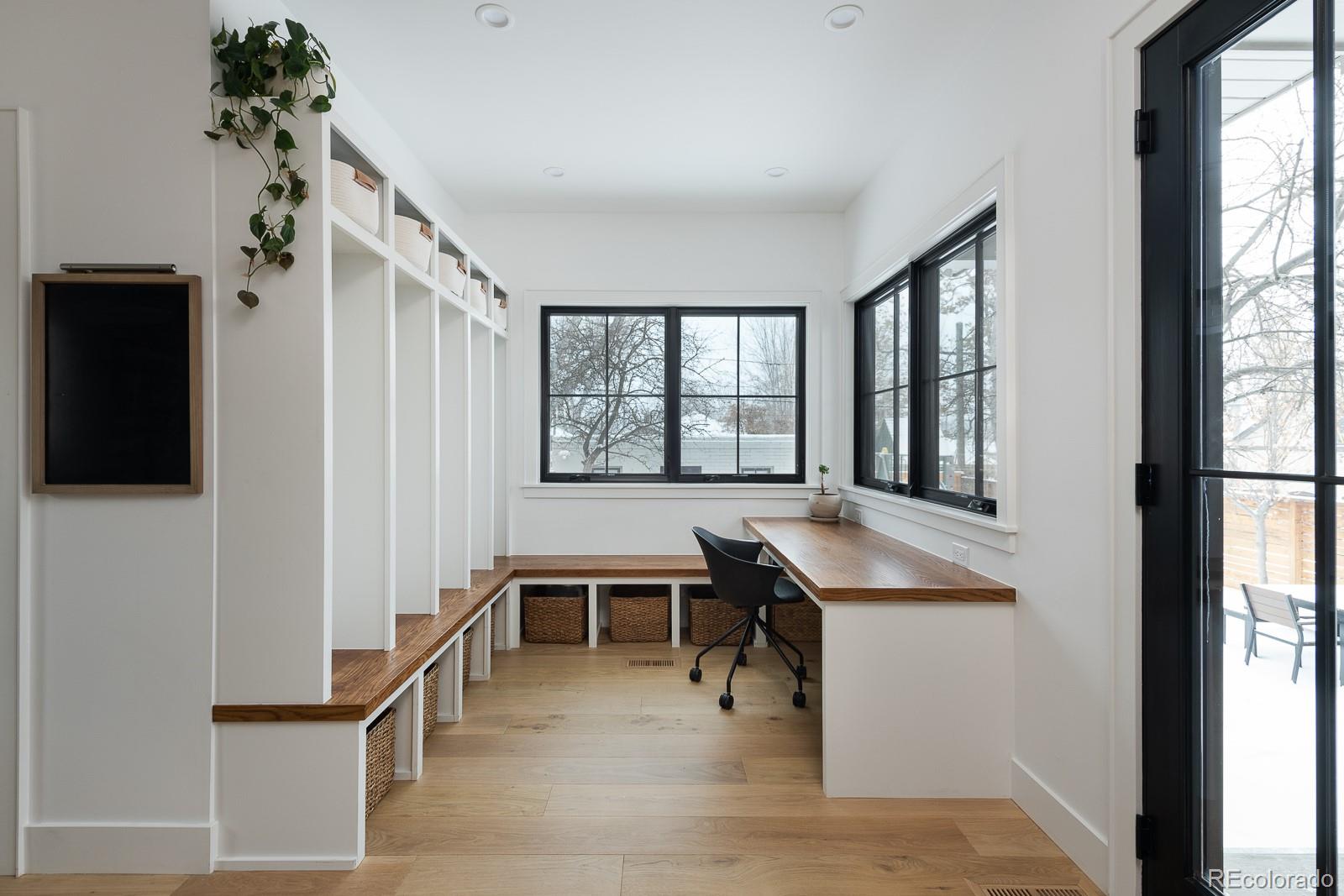 4150 Hooker Street Denver, CO 80211 - Photo 17 of 40 a room with furniture and a window