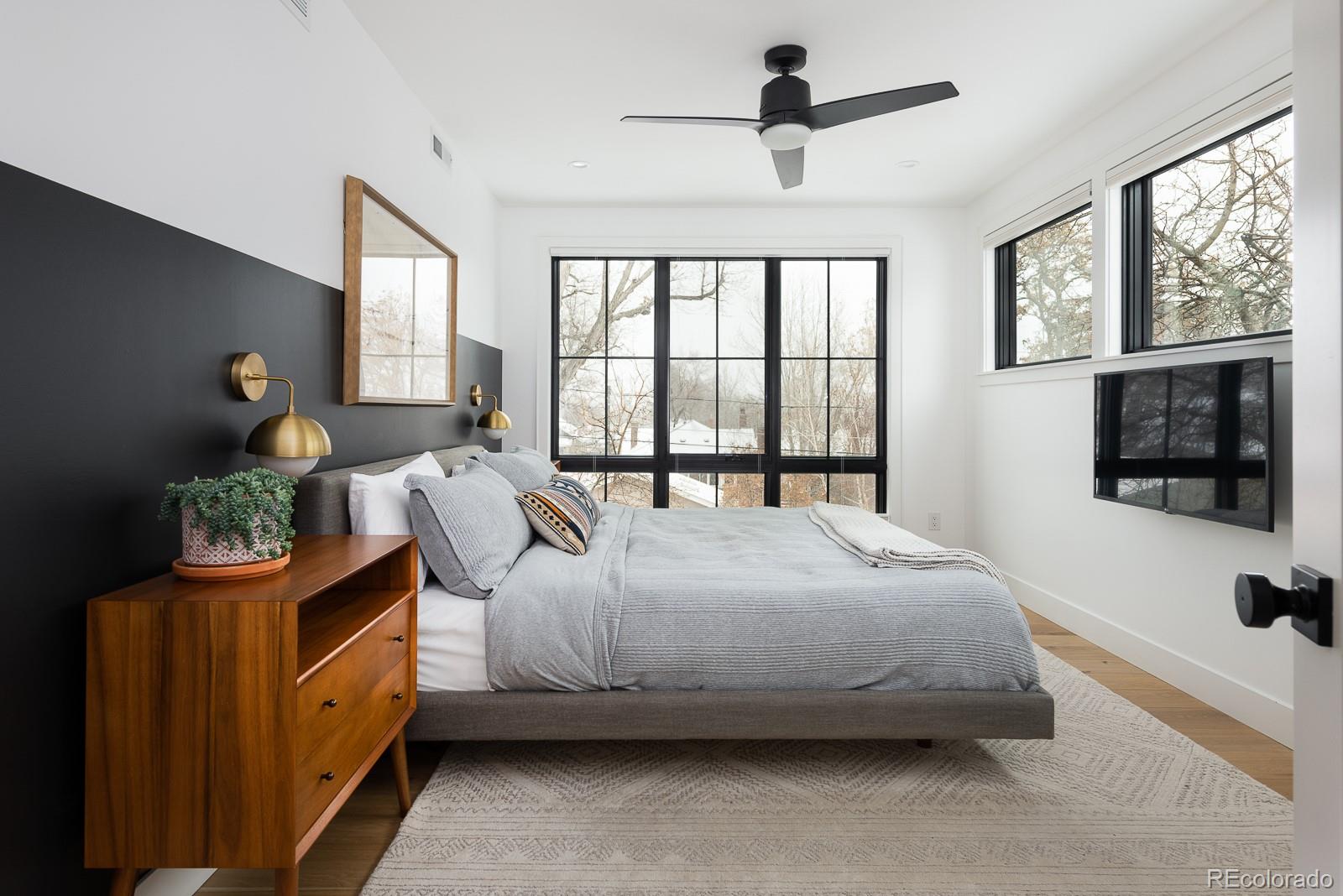 4150 Hooker Street Denver, CO 80211 - Photo 19 of 40 a bedroom with a bed and a window