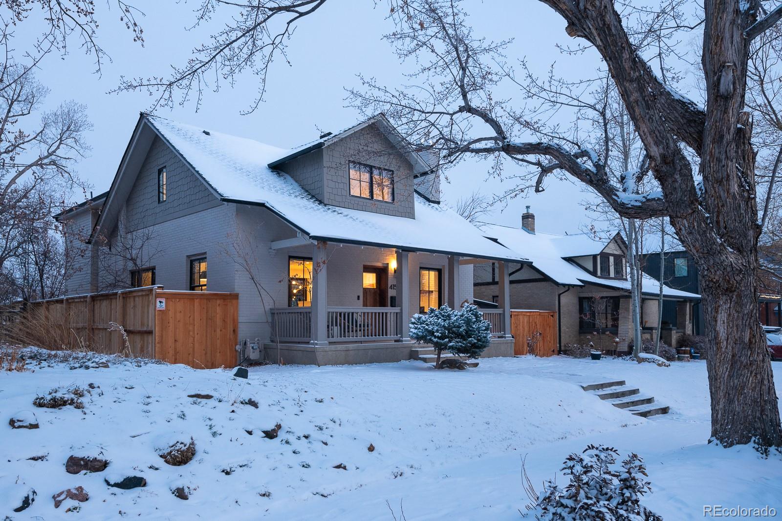 4150 Hooker Street Denver, CO 80211 - Photo 2 of 40 a front view of a house with a yard