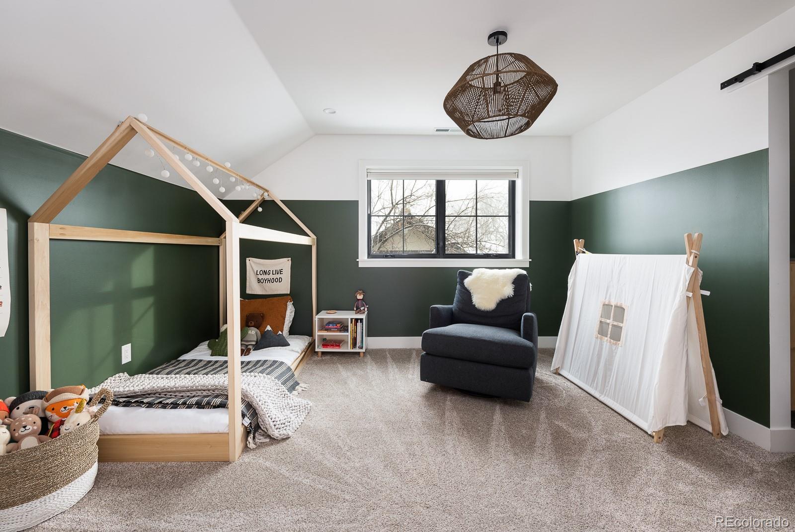 4150 Hooker Street Denver, CO 80211 - Photo 26 of 40 a living room with furniture and a window