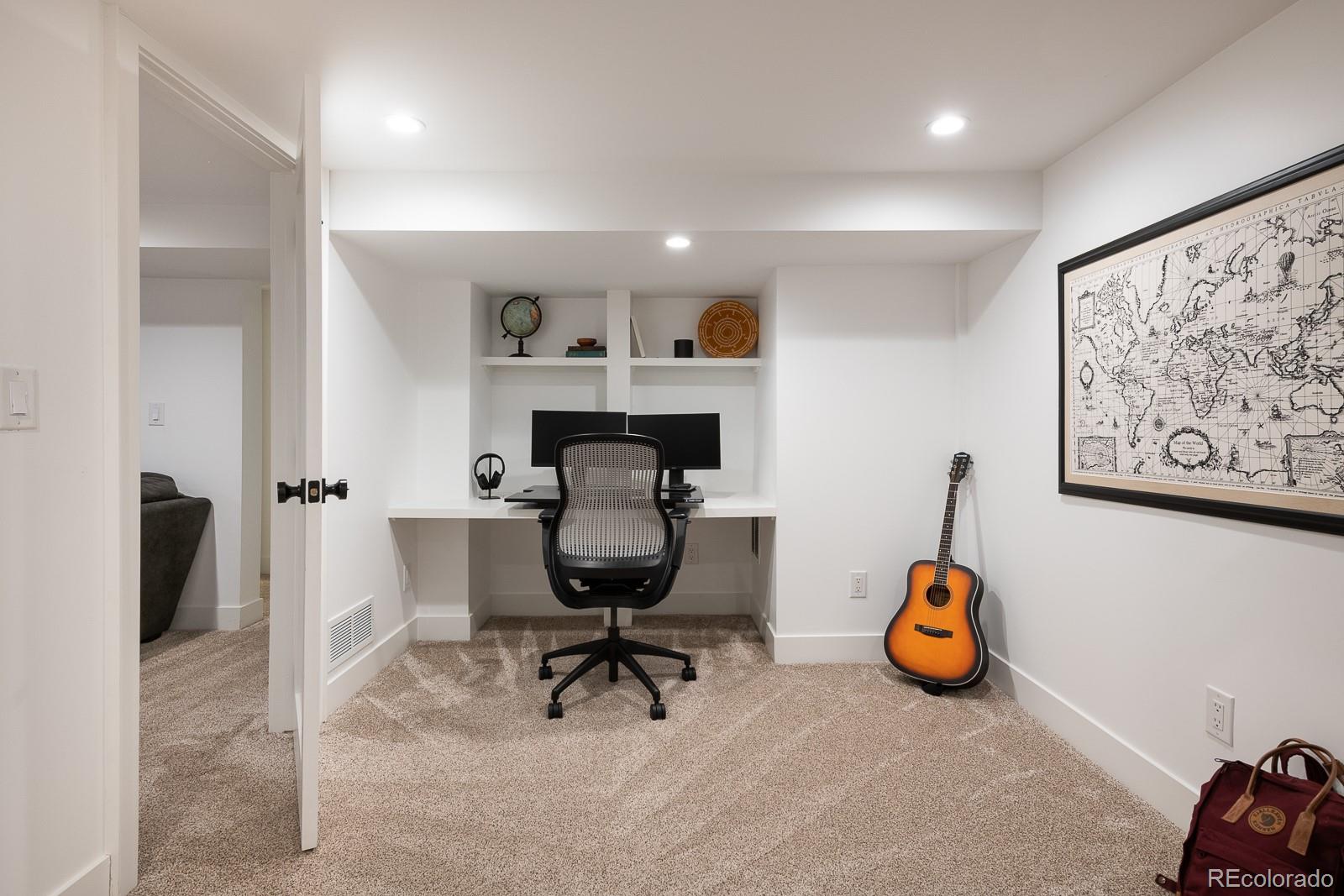 4150 Hooker Street Denver, CO 80211 - Photo 30 of 40 a view of a workspace with furniture and a window