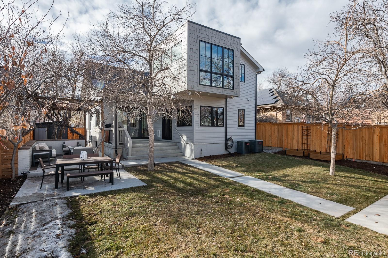 4150 Hooker Street Denver, CO 80211 - Photo 37 of 40 a front view of a house with a yard