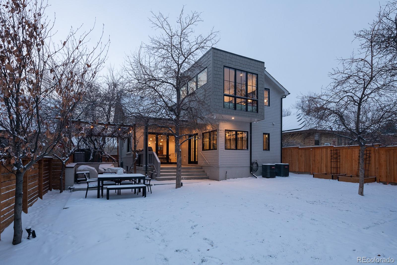 4150 Hooker Street Denver, CO 80211 - Photo 40 of 40 a view of a house with a yard and sitting area