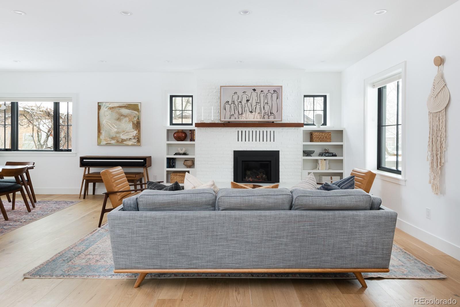 4150 Hooker Street Denver, CO 80211 - Photo 6 of 40 a living room with furniture and a fireplace