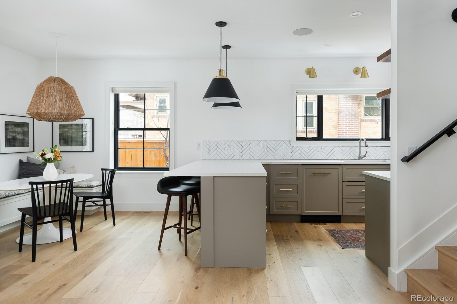 4150 Hooker Street Denver, CO 80211 - Photo 10 of 40 a kitchen with a table and chairs in it