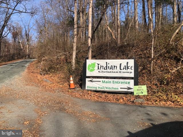 3909 River Road Darlington, MD 21034 - Photo 2 of 9 a sign on the side of a road