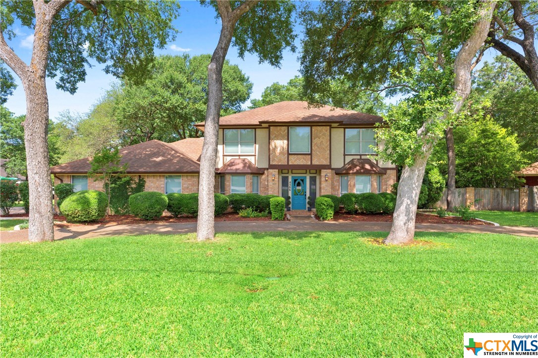 4306 Hickory Road Temple, TX 76502 - Photo 1 of 1 a front view of a house with a yard and trees